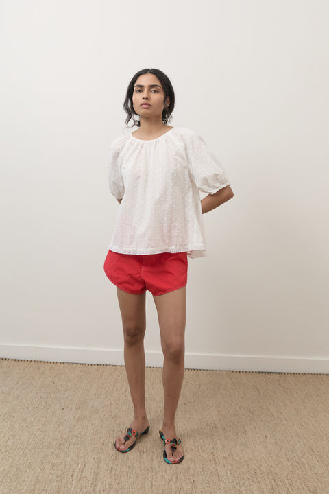 Silvia is 5’6” and wears XS