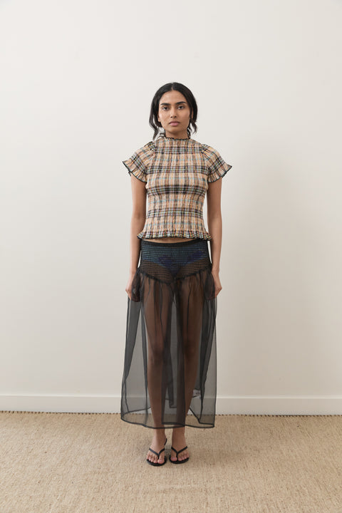 Silvia is 5’6” and wears XS