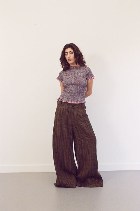 Mikaela is 5’3” and wears XS