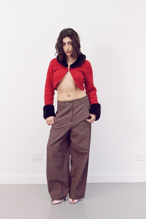 Mikaela is 5’3” and wears XS